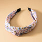 JOSSLYN by wall to wall - FLOWER PRINT KNOTTED HAIR BAND | 40HB243: BLACK
