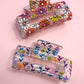 JOSSLYN by wall to wall - JUMBO FLORAL SUNFLOWER RECTANGLE HAIR CLAW CLIPS | 40H899: Hot Pink